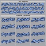 Maglia da baseball Raglan, grigio chiaro, personalizzata, autentica, maniche blu navy Maglia da baseball Raglan, grigio chiaro, personalizzata, autentica, maniche blu navy
